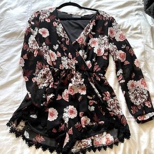 Floral romper by Astr. Size medium